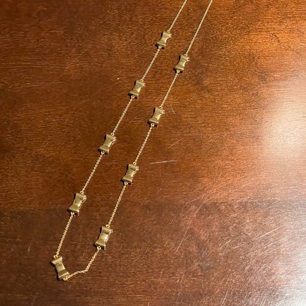 Kate Spade bow necklace in gold